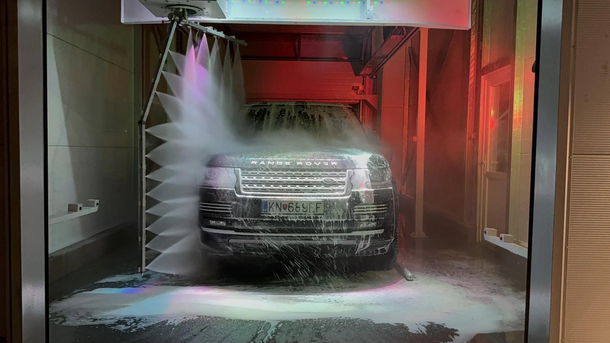 OLEA · robot washing with coloured lighting